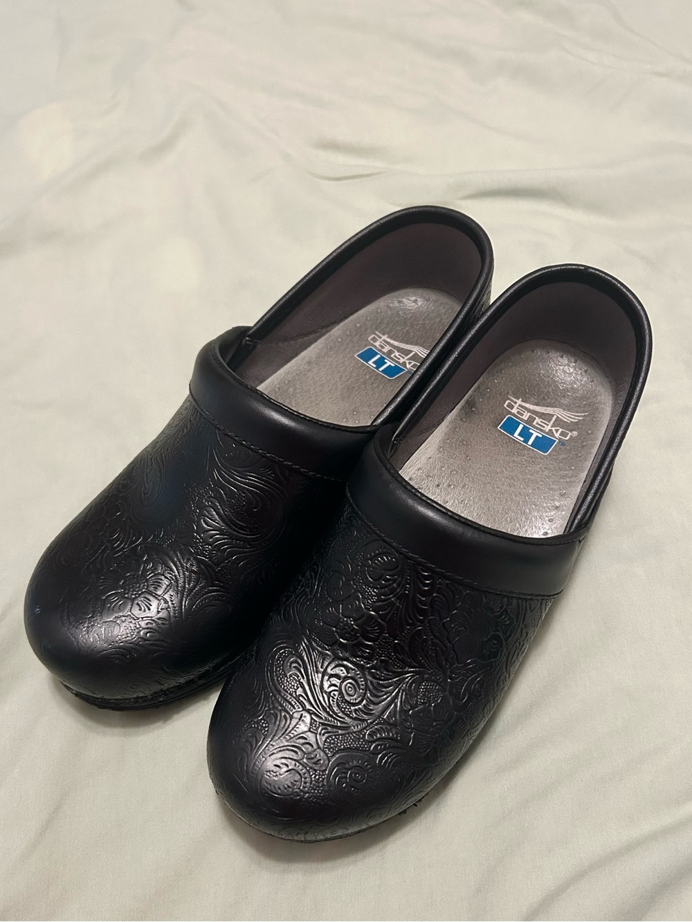 Dansko Black Embossed Leather Slip-On Clogs